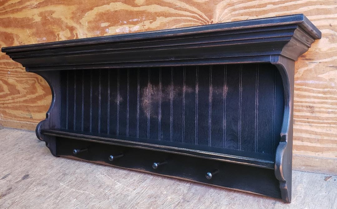 Rustic style colonial shelf with pegs