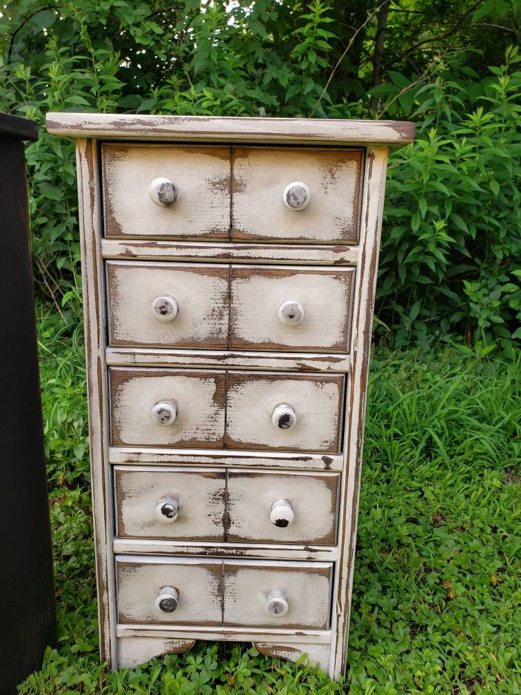 Primitive apothecary cabinet with 5 drawers in distressed white finish